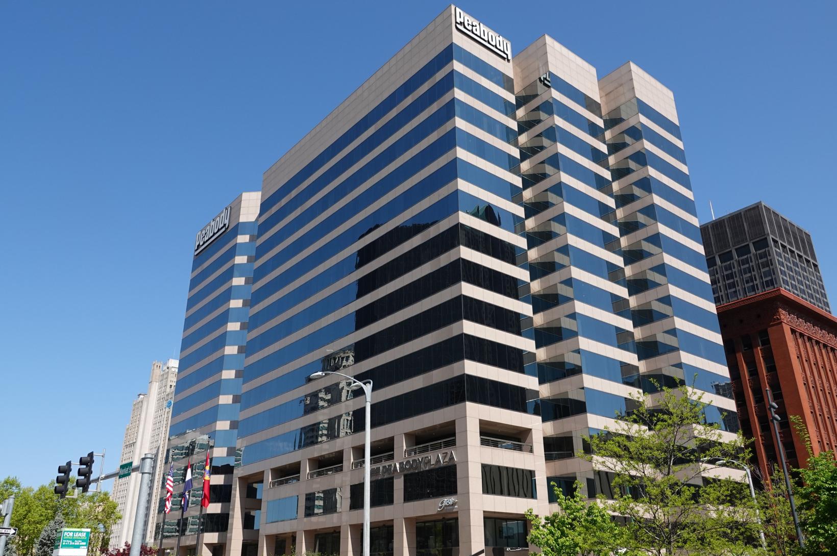 The Peabody building in Downtown St. Louis, set against a blue sky.